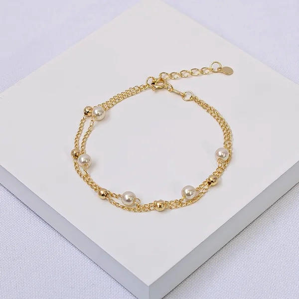 Pulseira dourada dupla esferas e pérolas