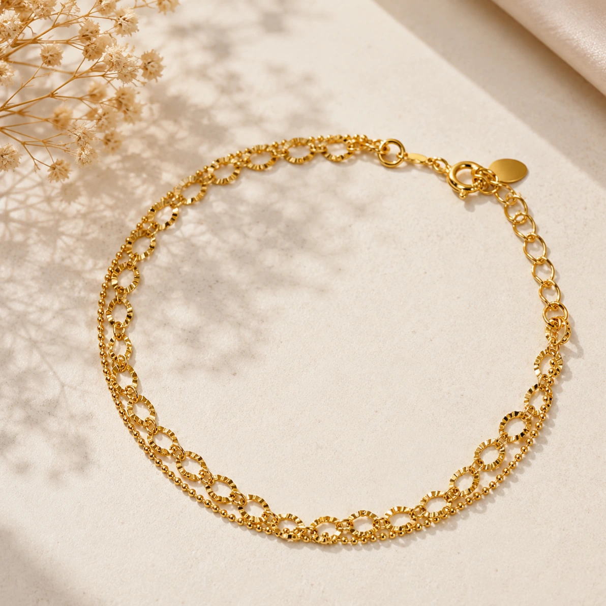 Pulseira dourada dupla bolinhas e elos diamantados