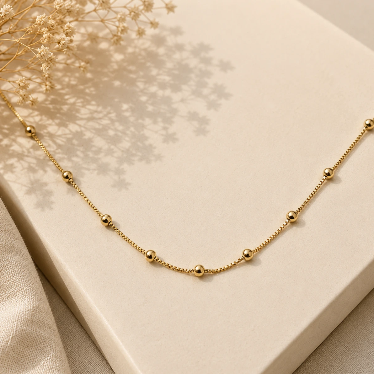 Colar dourado bolinhas 60 cm