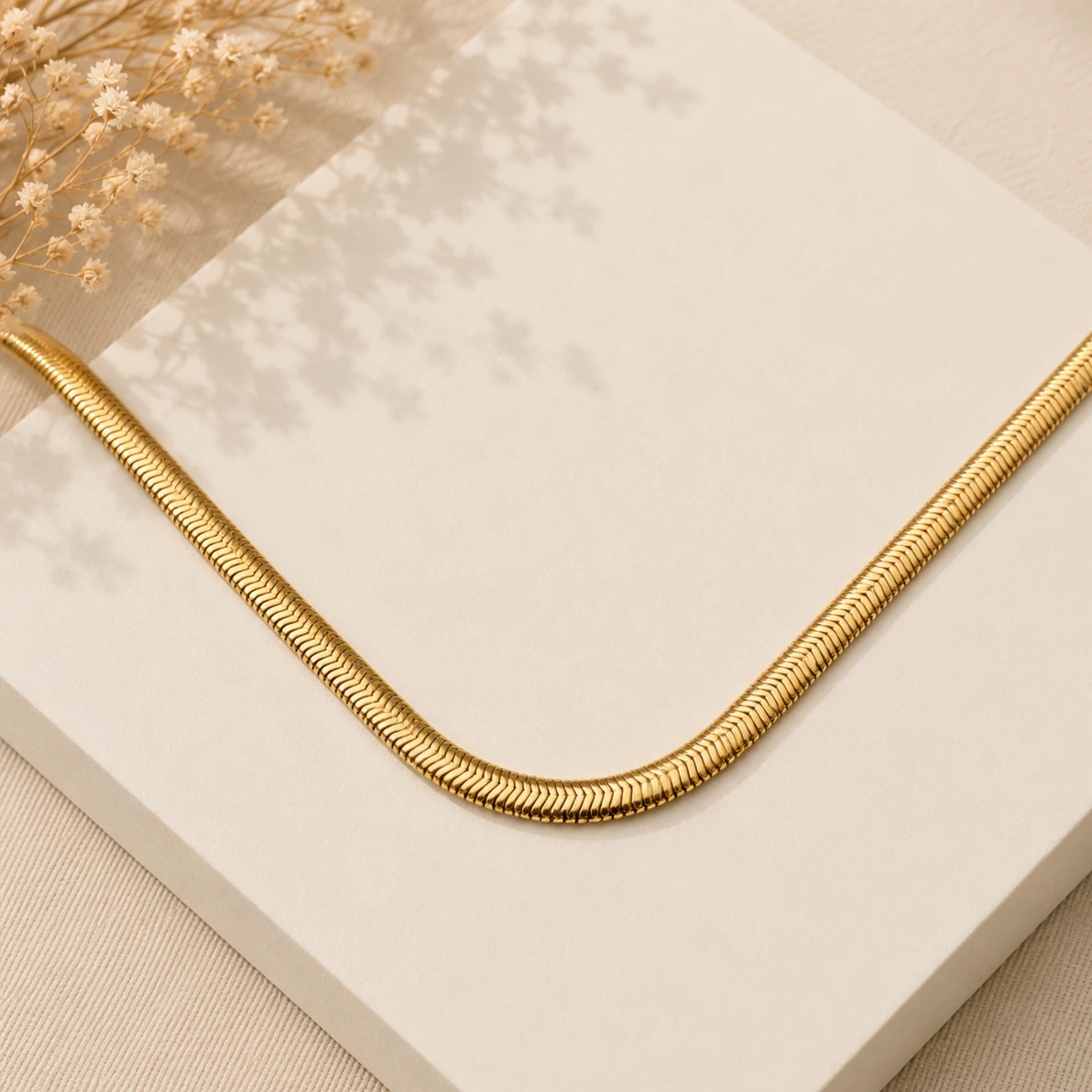 Choker dourado malha serpente