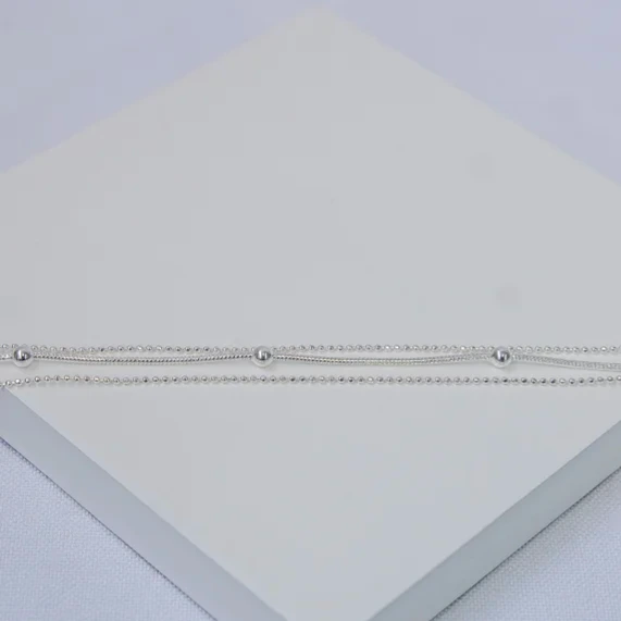 Pulseira prata tripla bolinhas