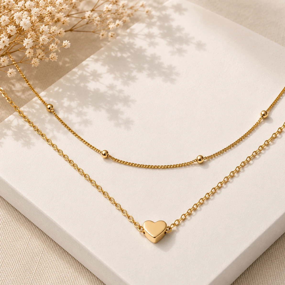Colar duplo dourado bolinhas e coração