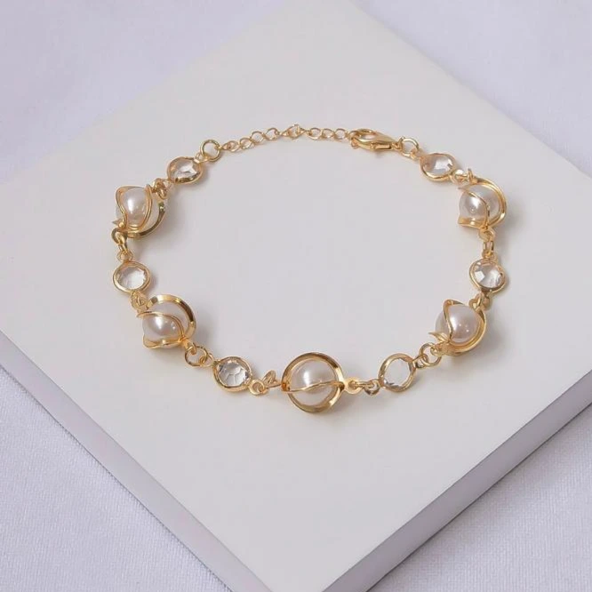 Pulseira dourada pérolas e cristais