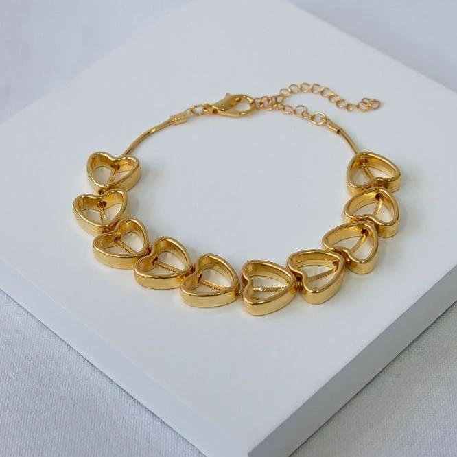 Pulseira dourada corações vazados