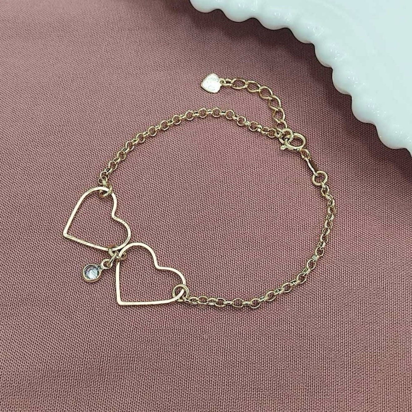 Pulseira dourado 2 corações vazados