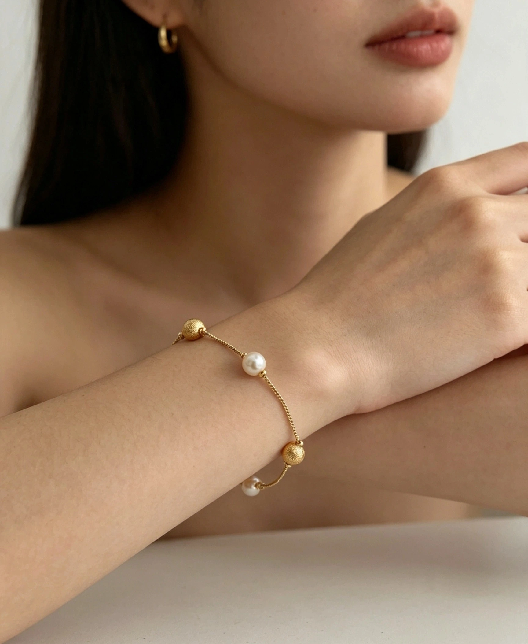 Pulseira Pérolas Douradas