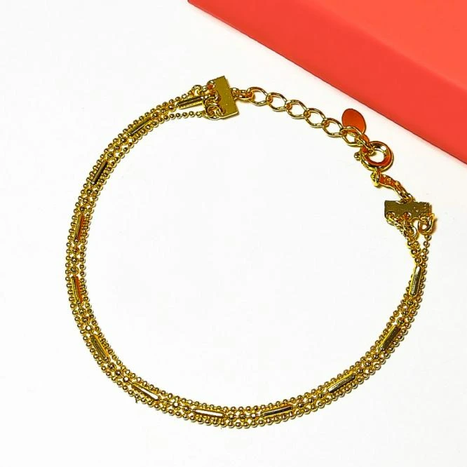 Pulseira dourada tripla bolinhas e canudinhos