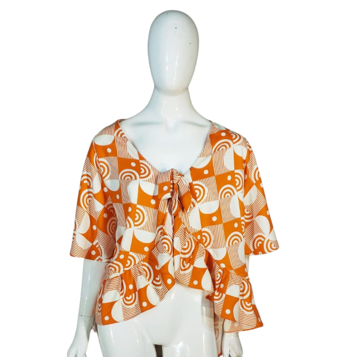 Blusa Tranpassada na Frente com Babados na Barra