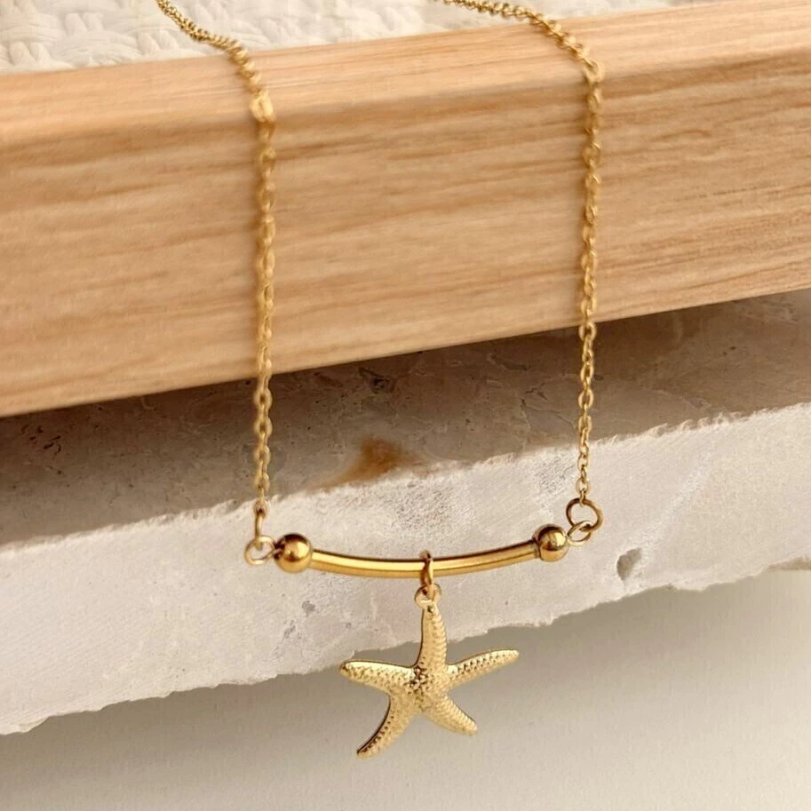 Choker aço dourado estrela do mar