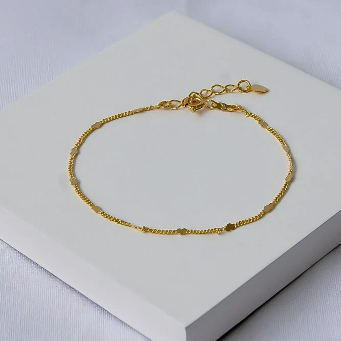 Pulseira dourada chapinhas redondas