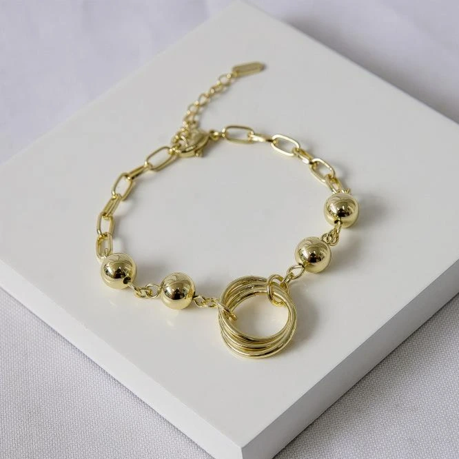 Pulseira dourada esferas e elos